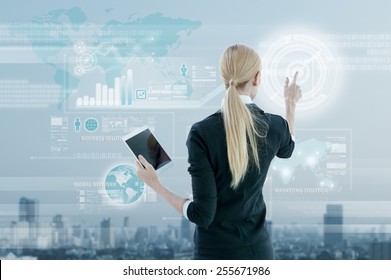 Businesswoman working on digital virtual screen, business strategy concept