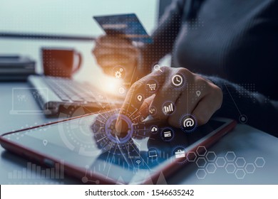 Businesswoman working on laptop and coding software developer work with AR new design dashboard computer icons, Double exposure, Analysis and fund management concept.
