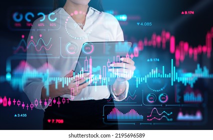 Businesswoman working with tablet. Colorful stock market analysis, double exposure, forex hud with numbers and lines. Concept of online trading