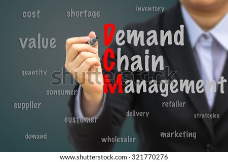 Businesswoman write Demand Chain Management (DCM) relation concept.