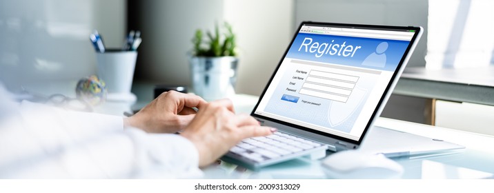Businesswoman's Hand Filing Online Registration Form On Laptop - Shutterstock ID 2009313029