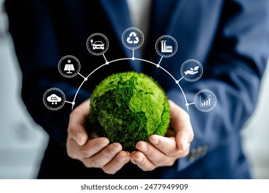 Businesswomen holding green ball globe with ESG icon concepts for Environment, Social, Governance, net zero, carbon neutrality goals, development business sustainable environment concept. - Powered by Shutterstock