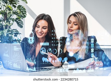 Businesswomen working with laptop, virtual screen with forex diagrams and big business data research. Concept of financial analysis and teamwork