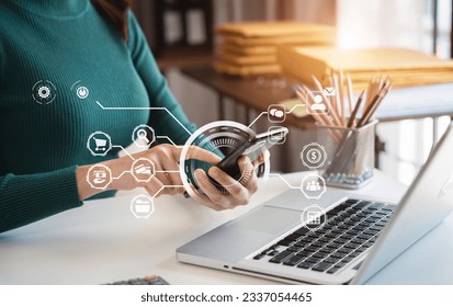 Businesswomen working with smart phone and laptop and digital tablet computer in office with digital marketing media in virtual icon.