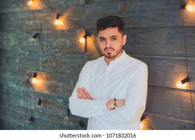 Businness guy in front bright idea light bulbs concept