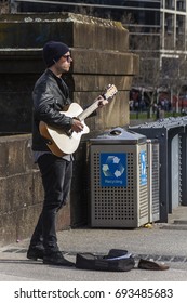 BUSKING, MELBOURNE,AUSTRALIA-4th SEP 2016:-A Busker Singing On One Of The Many Bridges Crossing The Yarra River