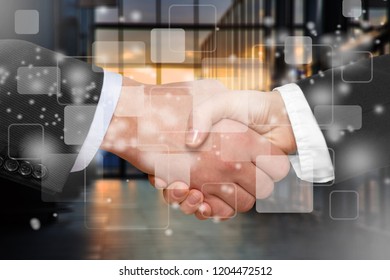 Bussines Partners Handshakes In Modern Open Space