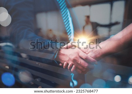 Bussiness and investment success concept. Businessmen shake hands and get to know each other before they start agree to do business together.