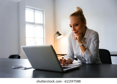 Bussiness Woman Reading News On The Web