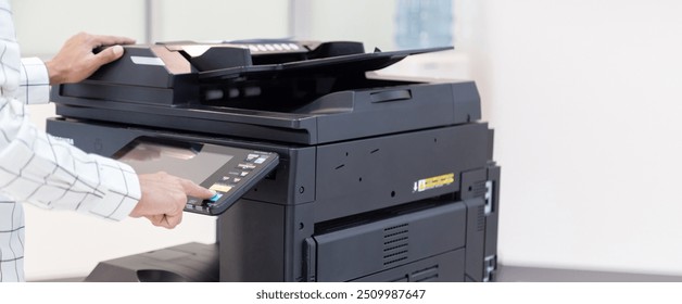 Bussinessman press button on panel of printer photocopier  network , Working on photocopies in the office concept , printer is office worker tool equipment for scanning and copy paper.