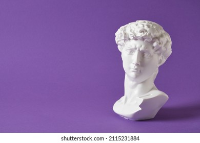 bust of david replica on purple background copy space, copy of work by michelangelo
