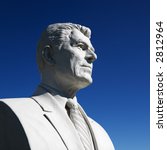 Bust of Ronald Reagan sculpture against blue sky in President