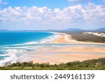 Bustard Bay beach, deserted long expanse, blue water and sky, discovery coast, 1770, Queensland