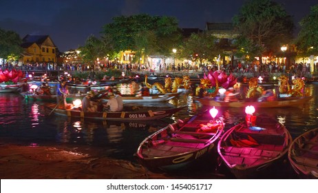 A Bustling Scene: Night Boat Ride at Ancient Town of Hoi An, Vietnam 