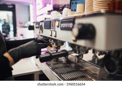 Busy Barista Operating A Modern Coffee Machine At Cafe