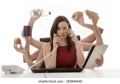 Busy Business Woman Multitasking In The Office With Eight Arms