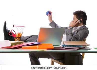 Busy Businessman Playing Office Basketball And Talking On A Phone