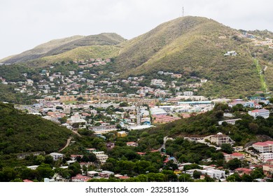 Busy city among green tropical hills on St Thomas