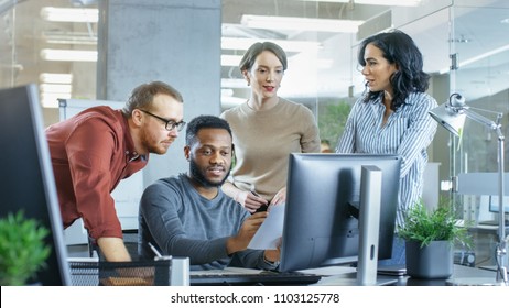 In Busy Corporate Office Team of Diverse Young Creative People Work on a Problem Solution. Collectively They Try to Help Coworker to Solve Problem. - Shutterstock ID 1103125778