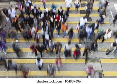 Busy Crossing Street In Hong Kong, China.