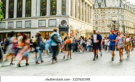 Busy Crowds Of Anonymous Motion Blurred Shoppers On London Street