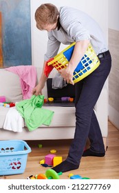 Busy Dad Cleans The Room And Talking On The Phone