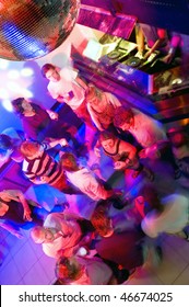 Busy Dance Floor In A Nightclub Near The DJ Booth