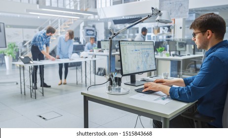 In the Busy Engineering Facility: Diverse Group of Engineers, Technicians, Working on Design for Industrial Engine Prototype. Specialists Talk During Meetings, Work with Drawings, Use Computers - Shutterstock ID 1515843668