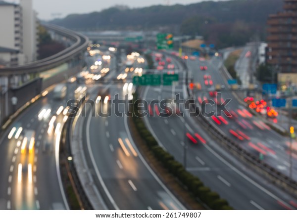 Busy highway at dusk\
- blurred background