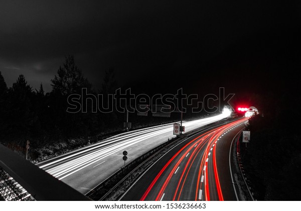 Busy\
Highway in the Night. Long Exposure with 3\
Lanes