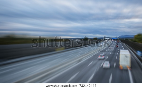 busy highway traffic in\
the evening 