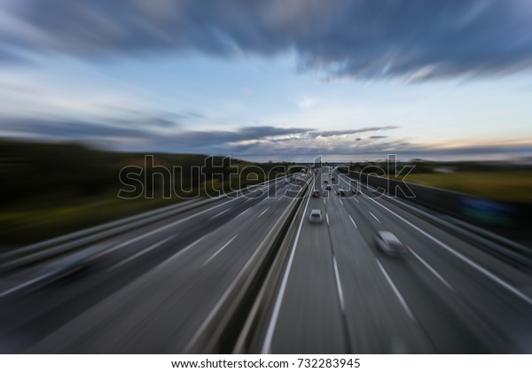 busy highway traffic in\
the evening 