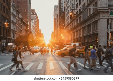 Busy intersection is crowded with people and cars on 5th Avenue and 23rd Street in New York City with sunset background