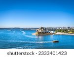 A busy morning around the Sydney Opera House,the transportation boat are cruising in front of the famous Sydney landmark
