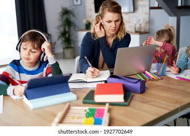 Busy Mother During Home Office With Children At Home