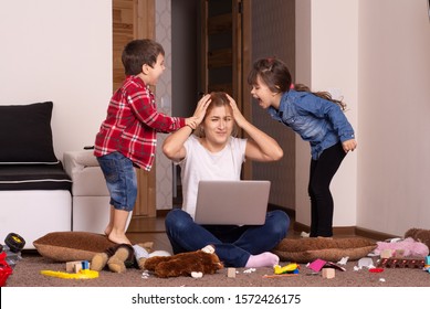 Busy Mother And And Romping Kids Multitasking Woman. 