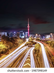 Busy Motorway In Auckland With Sky Tower 