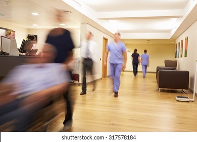 Busy Nurse's Station In Modern Hospital