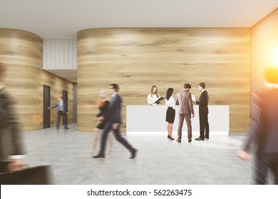 Busy Office. People Are Walking, Entering Doors In A Corridor, Talking And Discussing Work Issues. Wooden Walls, Concrete Floor. 3d Rendering. Mock Up. Toned Image