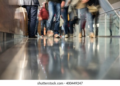 Busy People In Reflection At A Fair - Blurred View