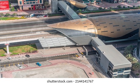 Busy Sheikh Zayed Road Traffic Aerial Timelapse, Metro Station Exit And Footbridge. Dubai City, United Arab Emirates