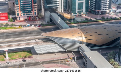 Busy Sheikh Zayed Road Traffic Aerial Timelapse, Metro Station Exit And Footbridge. Dubai City, United Arab Emirates