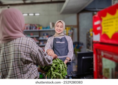 In a busy store, a cheerful shopkeeper serves fresh greens to a customer, showcasing community - Powered by Shutterstock