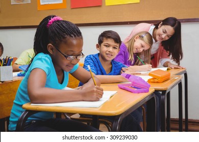 Busy Students Working On Class Work At The Elementary School