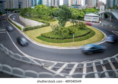 busy traffic road with modern cityscape in background of China. - Shutterstock ID 489340549