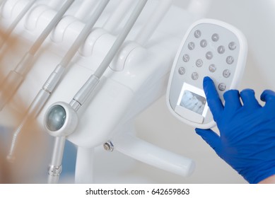 Busy Trained Dentist Setting Up Her Equipment