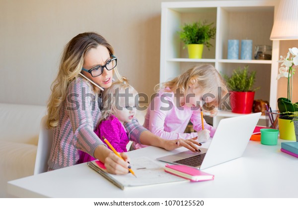 Busy Woman Trying Work While Babysitting Stock Photo (Edit ...