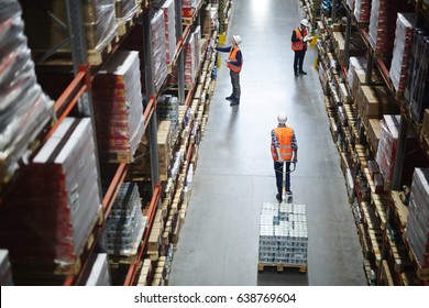 Busy workers inside storehouse of hypermarket