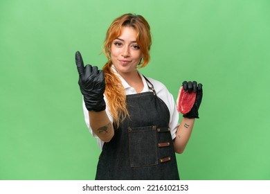 Butcher Caucasian Woman Wearing An Apron And Serving Fresh Cut Meat Isolated On Green Screen Chroma Key Background Doing Coming Gesture