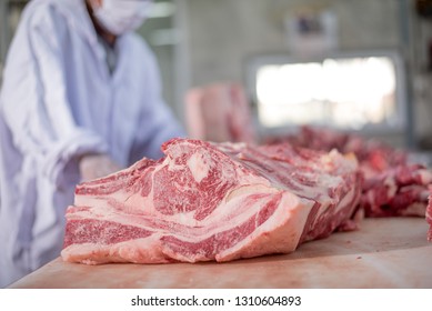 Butcher cutting meat food industry concept